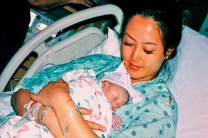 Golfer Michelle gives birth to baby: Waited my entire life to meet you