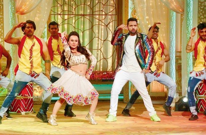 Swargiary on stage at a dance reality show in 2015
