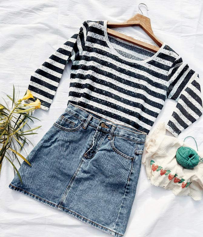 Striped blue top with cut detailing from Bossini