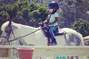 Sunny Leone is a proud mama as Nisha takes her first riding lesson