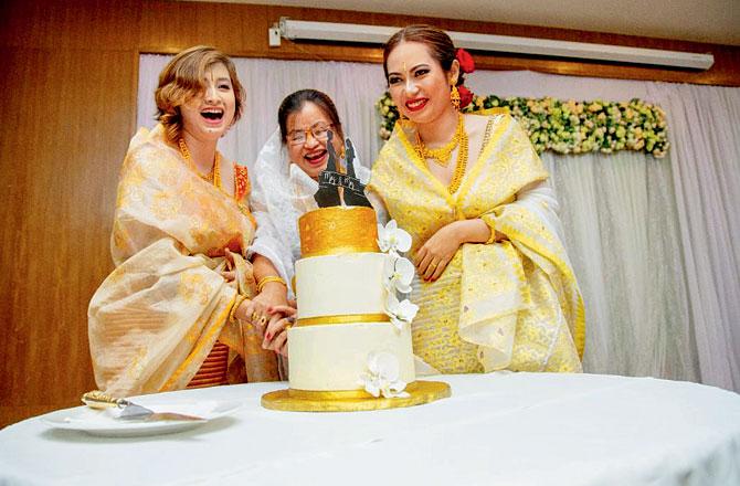 A same sex couple from Manipur, Deepika Naorem and Jocelyn Akoijam, cut their wedding cake