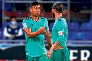 Casemiro helps Real Madrid beat Espanyol to go atop La Liga