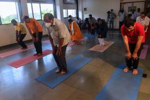 Practitioners mark International Yoga Day with exercises at home