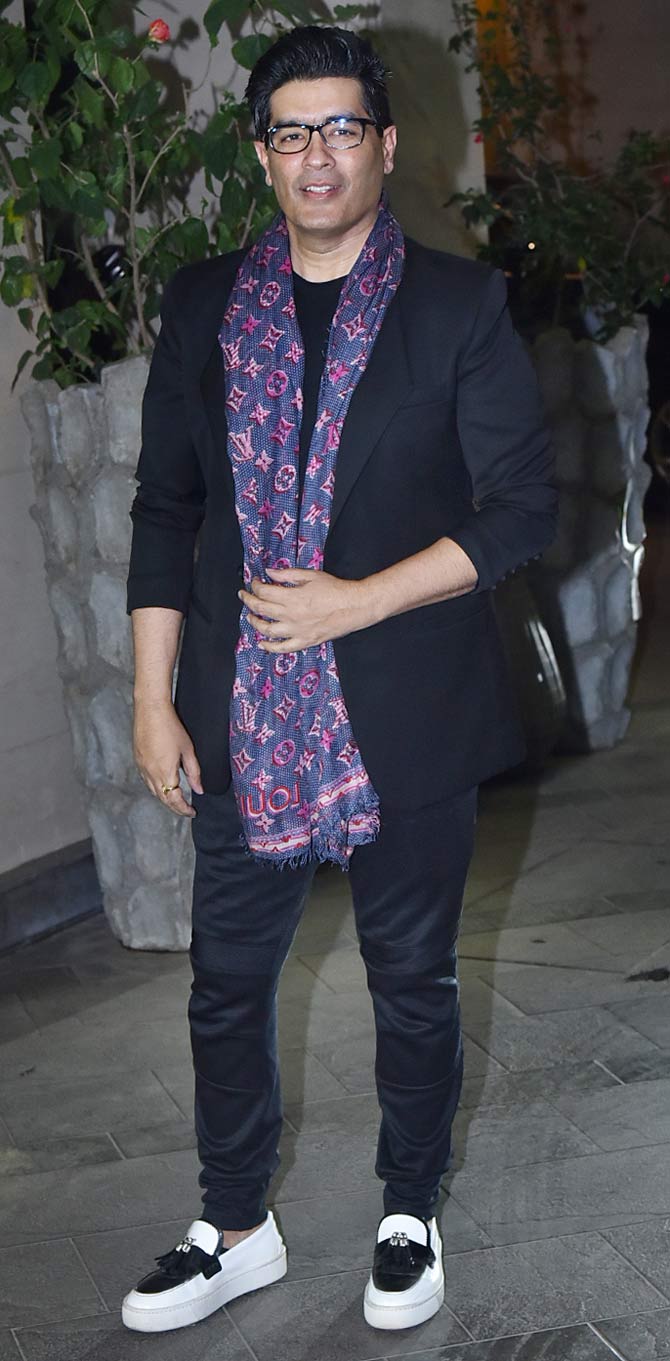 Manish Malhotra can never go wrong when it comes to styling himself or his actors. He kept it simple yet stylish, and that scarf only adds to his persona.