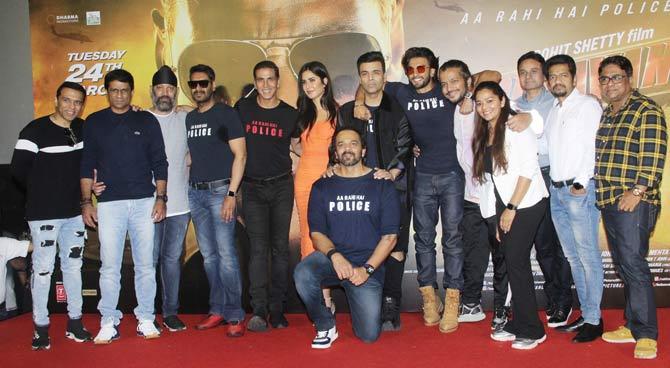 Sooryavanshi is all set to release on March 24, a day before Gudi Padwa, which also coincides with Mumbai theatres going 24/7.
In picture: The cast and crew of Sooryavanshi pose for the photographers at the trailer launch event in Juhu.