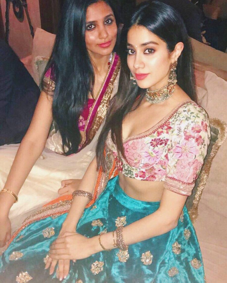 Doesn't Janhvi look drop-dead gorgeous in this lehenga? The teal of the skirt and pink of the blouse go really well together! If you're looking for wedding couture inspo, then this is it!