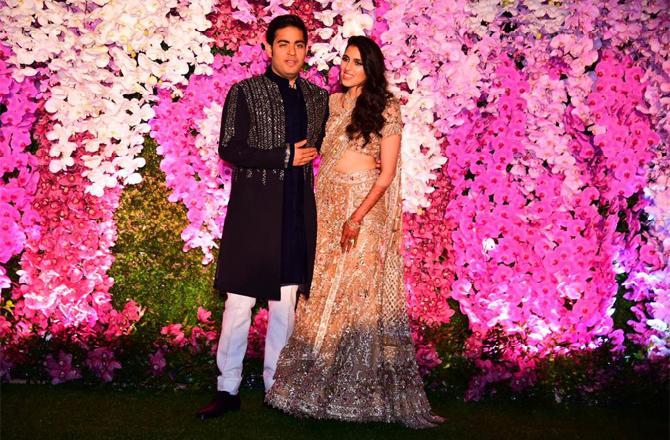 In photo: Akash Ambani and Shloka Mehta caught in a mushy moment during their wedding bash 