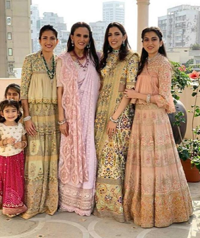 In September 2019, pictures of Shloka Mehta's pre-wedding festivities took the internet by storm. Donning a multi-coloured lehenga choli, Shloka looked radiant, as she posed for the lenses with her mom Mona Mehta and sister-in-law Nisha Seth Mehta and sister Diya Mehta.