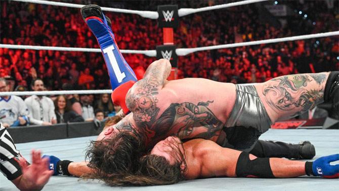 Aleister Black seized the opportunity and hit Black Mass on AJ Styles to pin him for the win