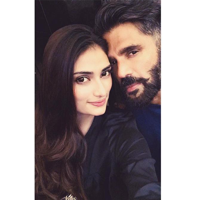 Suniel Shetty and Athiya Shetty: Athiya Shetty, who forayed into Bollywood with Hero, says sharing screen space with her father and actor Suniel Shetty will be a 'weird' experience for her. 