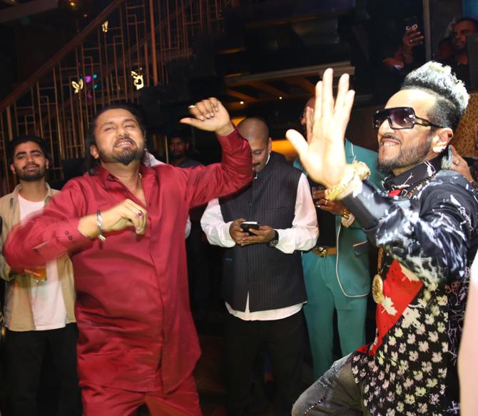 In picture: Honey Singh dances his heart out with friend-bhangra singer Jazzy B at the former's 37th birthday celebrations.