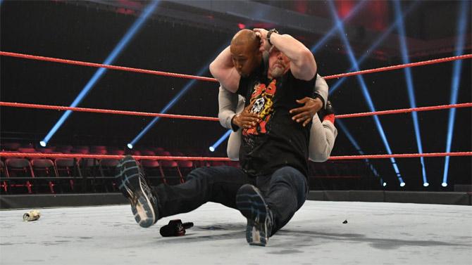 After toasting to some beer, Stone Cold Steve Austin hit Byron Saxton with, yes, The Stunner!