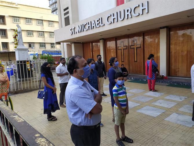 A total of 41 coronavirus cases, including 3 foreigners have been reported in Maharahstra with 15 tested positive in Mumbai. Among the 15, eight people are from the peripheral areas of Mumbai.
In photo: Devotees offer prayers at St Michael's Church, Mahim amidst the coronavirus outbreak