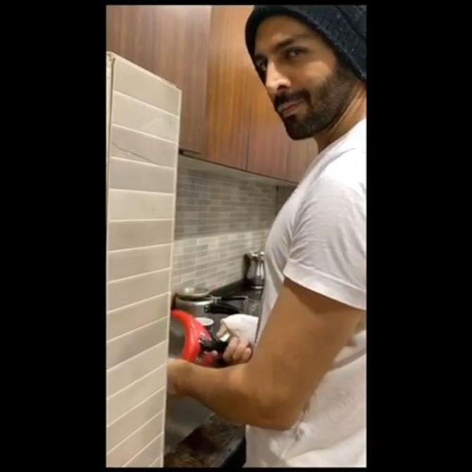 Kartik Aaryan: His monologue on Coronavirus wowed social media and even the Prime Minister of the country. Later, he gave a quirky twist to cheering and clapping initiative by PM Narendra Modi, for the ones who are serving during the coronavirus crisis. The actor was seen beating a plate and also wearing a pan on his head. And now, his sister Kritika Tiwari shared a video of the actor doing the dishes. She captioned it - Don't mistake this for Quarantine. This is the usual scene at home. Kartik quirkily reposted the video saying, 