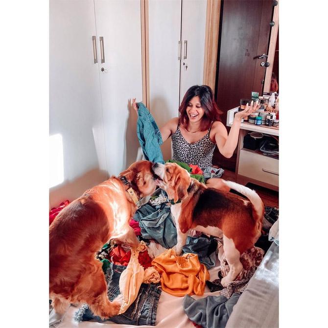 As can be seen in the picture, Kishwer surely is utilising her time at home for productivity in the times of the COVID-19 pandemic. She posted this photo of her bedroom, sitting right beside her wardrobe and busy cleaning it. Erm! with the help of her furry friends - Pablo Sexxobarr and Batuk Kishwer M Rai. She captioned this picture: Boys can you please take this fight somewhere else.. I am trying to sort out my clothes.