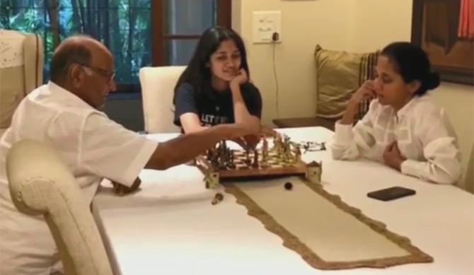 There is no better way than spening time with family during Qurantine and NCP leader Sharad Pawar is doing just that. NCP leader Supriya Sule shared a video where her father and NCP chief Sharad Pawar can be seen playing chess with his daughter Supriya and granddaughter Revati Sule. What's more! Supriya even said that within minutes her father won against the mother-daughter duo.