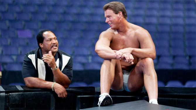 John Bradshaw Layfield and Farooq caught in a candid conversation prior to a WWE pay-per-view