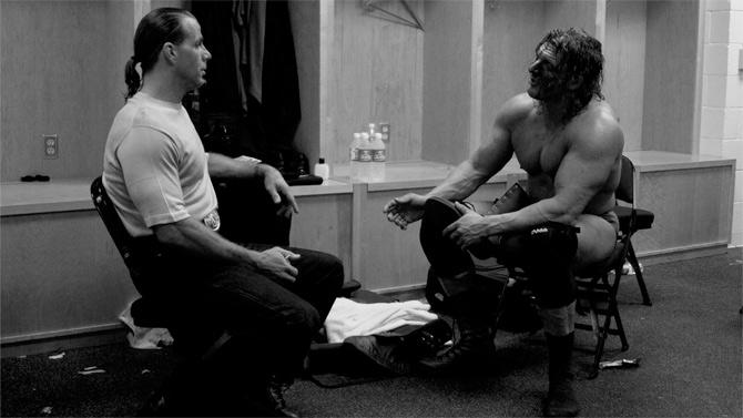 WWE superstars and D Generation X founders Triple H and Shawn Michaels in a candid chat in the dressing room after a match