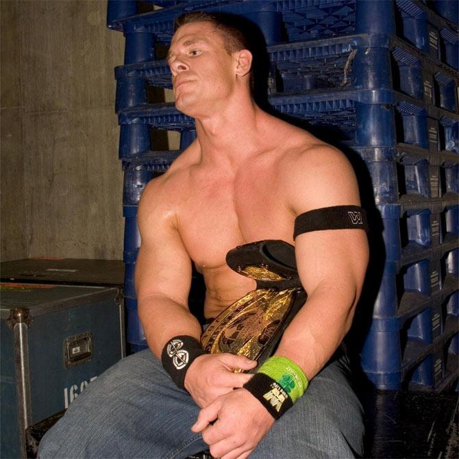 WWE superstar John Cena in a candid moment after winning the WWE title at WrestleMania 21. John Cena went on to become the biggest superstar in the Ruthless Aggression Era and is a record 16-time WWE world champion