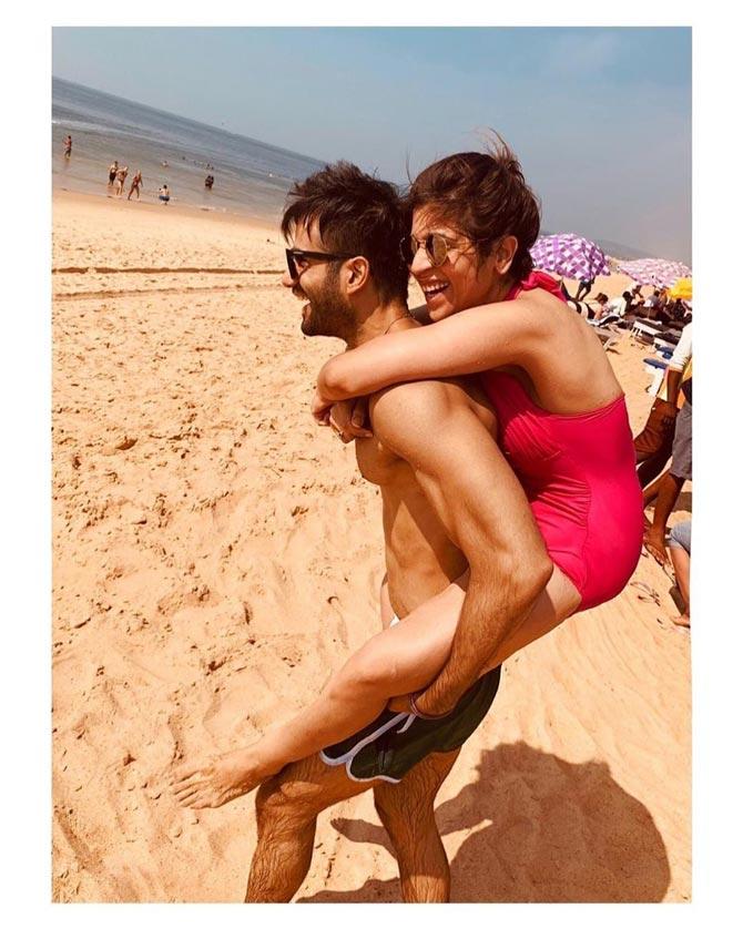 Karan Tacker is extremely close to his sister and the pair have a fun time whenever they get together. The actor is also quite the beach bum as many of his Instagram pictures prove!
Pictured: Karan Tacker gives his sister a piggyback ride on the beach