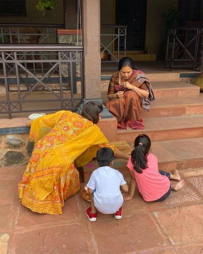 In photo: Rohit Pawar's wife and mother decorate the Gudi as the kids get ready to celebrate the festival.