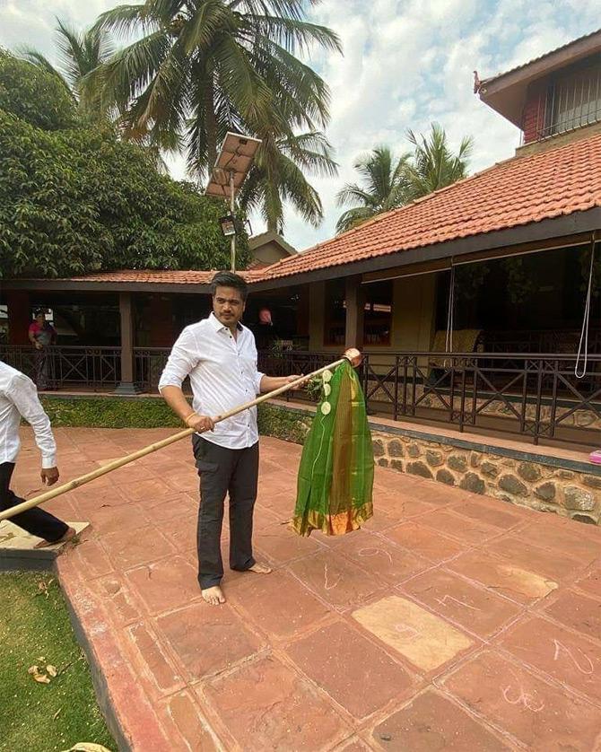 In photo: Rohit Pawar holds the Gudi in his hand as he sets to welcome the new year amid the coronavirus crisis.