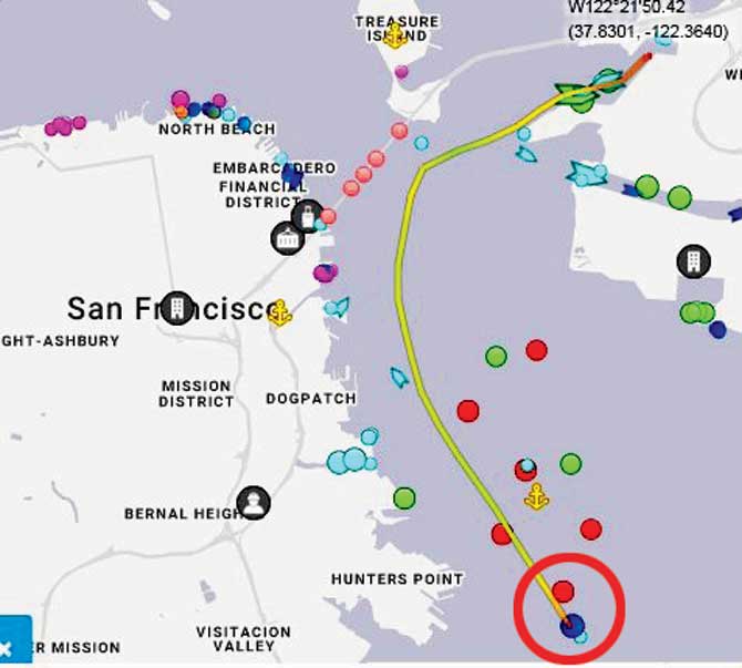 A satellite image shows the current location (blue dot, circled) of The Grand Princess