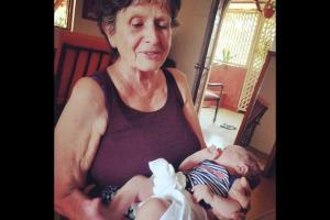 Kalki's baby girl looks content nestled in the arms of her grandma!
