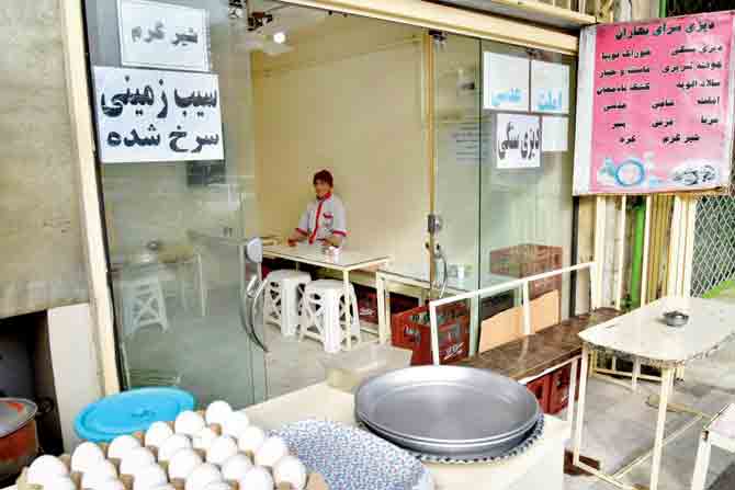 A traditional coffee shop in Gorgan remains open despite orders for closure
