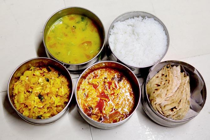 Jyotsana Kesariya has been using her one-room home in Shankar Bari Lane to prepare thepla and daily tiffins of Gujarati specialities like sev tameta nu shak, cabbage, dal, rice and pickle for 32 years