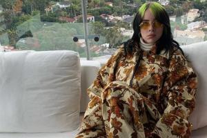 Billie Eilish strips down in concert to protest body shaming