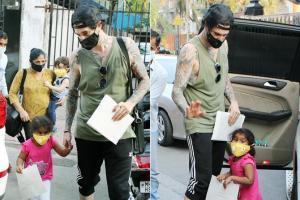 Daniel Weber snapped with little Nisha in Juhu, all masked!