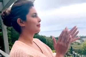 Out of India, but there in spirit! PC too stood in her balcony to clap