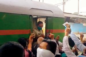 Railways suspends maintenance car after commuters try to storm wagon