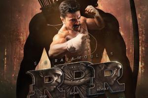 Ajay Devgn shares Ram Charan's first look from RRR on his birthday
