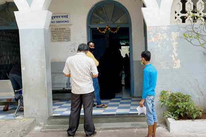 Patients standing in a queue at a distance from each other at DM Petit Municipal Hospital, Vasai. PIC/hanif patel
