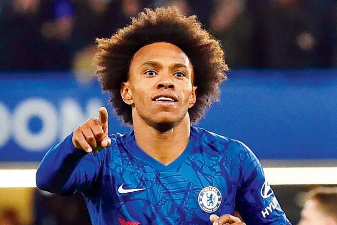 Chelsea’s Willian celebrates scoring v Liverpool on Tuesday
