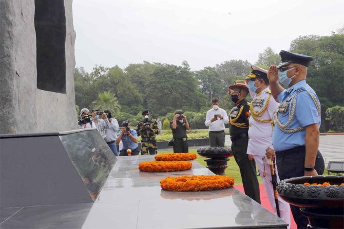 In photo: The three service chiefs pay homage to the matryrs at the National Police Memorial in New Delhi.