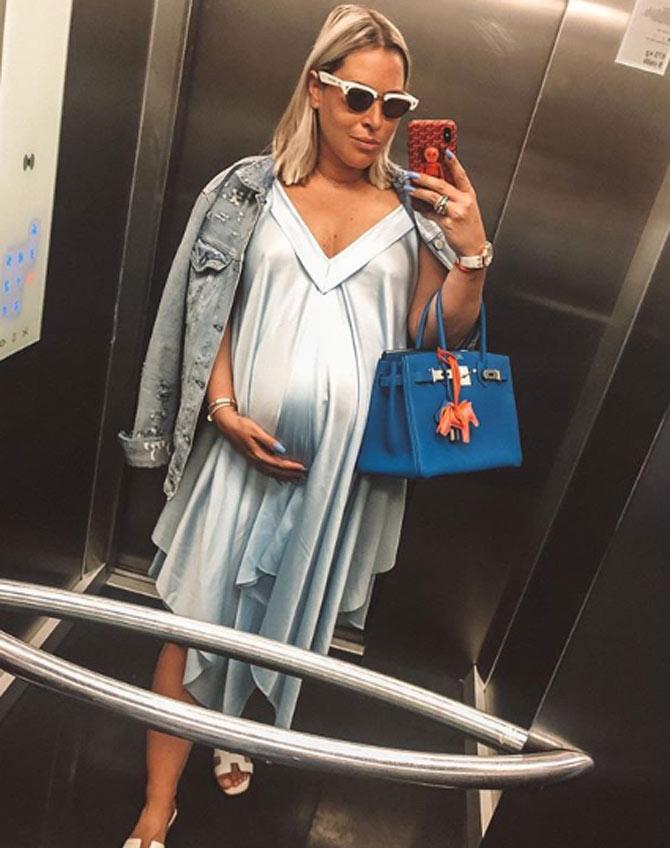 Dominika Cibulkova shared this photo and also said what colour she loves for her baby boy - Baby blue for baby boy my new (the most comfy) dress by @dendis_official exclusively from @privee.lounge Denim jacket actually stolen from my husband closet (RUSKO V KABELKE)
