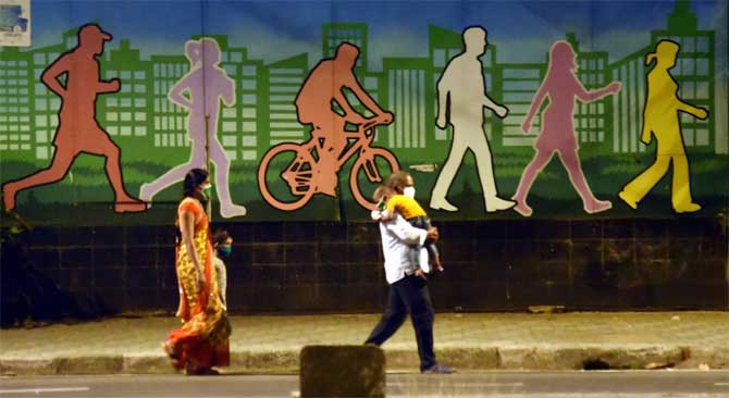 Maharashtra health officials said that while Mumbai has 12,864 COVID-19 cases, an additional 178 cases have been reported, but are yet to be added to the tally.The ministry said that 17847 people have so far recovered from the infection.
In picture: A family of a migrant worker walk along the Eastern Express Highway to their home town in Madhya Pradesh.
