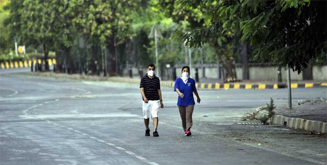 The health department said in a statement that as the virus claimed 49 more lives, the death toll rose to 1,068.
In picture: Morning walkers are spotted taking a stroll on an empty road in Bandra Kurla Complex.