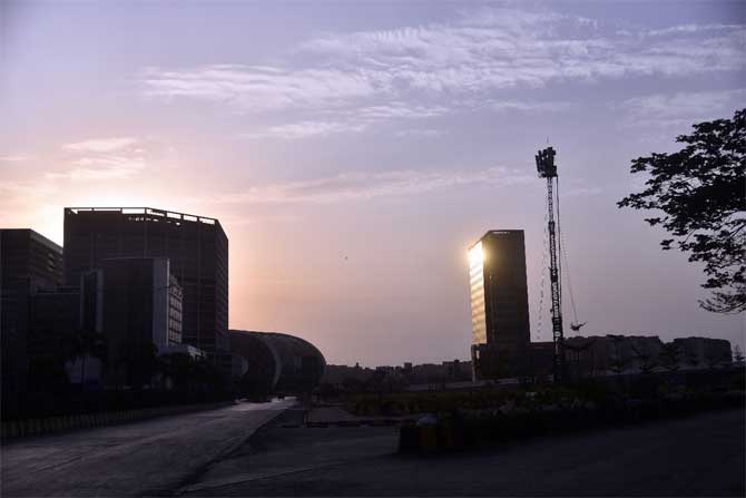 As many as 505 COVID-19 patients were discharged from hospitals in the state, taking the number of recovered persons to 6,564. 
In picture: Sun shines over a building in Bandra Kurla Complex