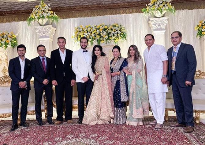 Asad shared this photo from a wedding reception along with his father Azharudding and their family and wrote, 