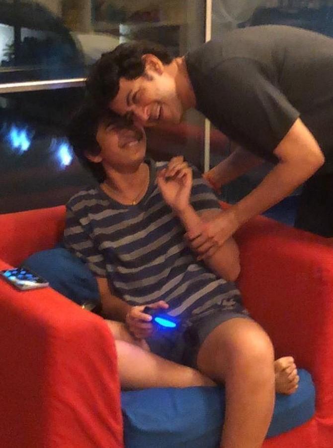 Here's another beautiful picture of himself with his son Gautam. In the picture, the father-son duo can be seen enjoying some candid moments. 