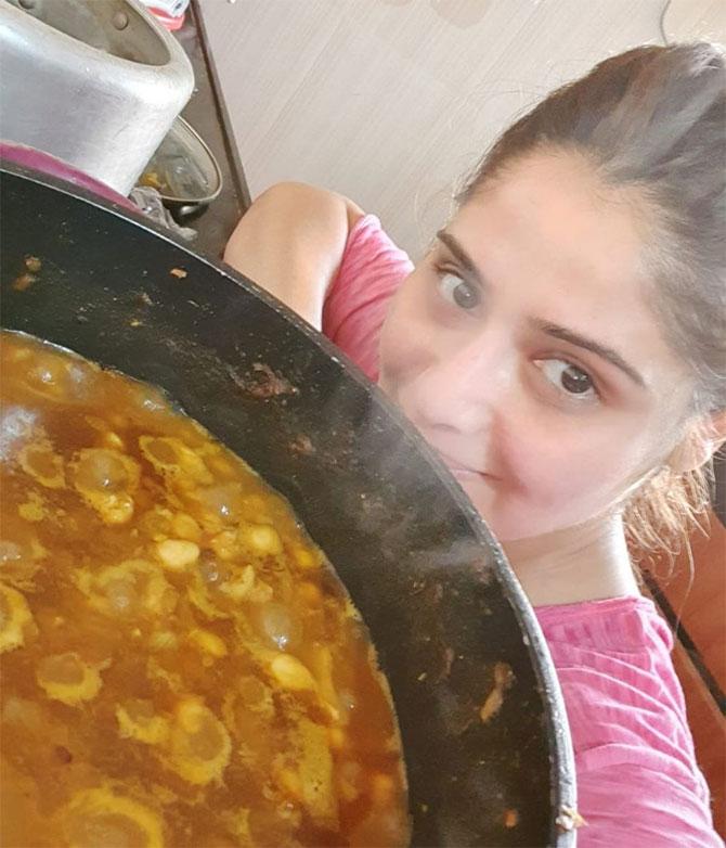 Arti Singh shared this photo of her getting back to cooking for the first time after leaving the Bigg Boss 13 house and wrote, 