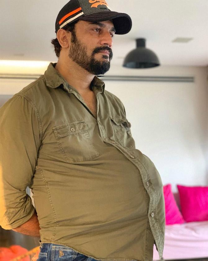 This one cracked us up! Posing for the camera, Sharad Kelkar shared how to quarantine period, which doesn't allow any gym outings, has given him a paunch.