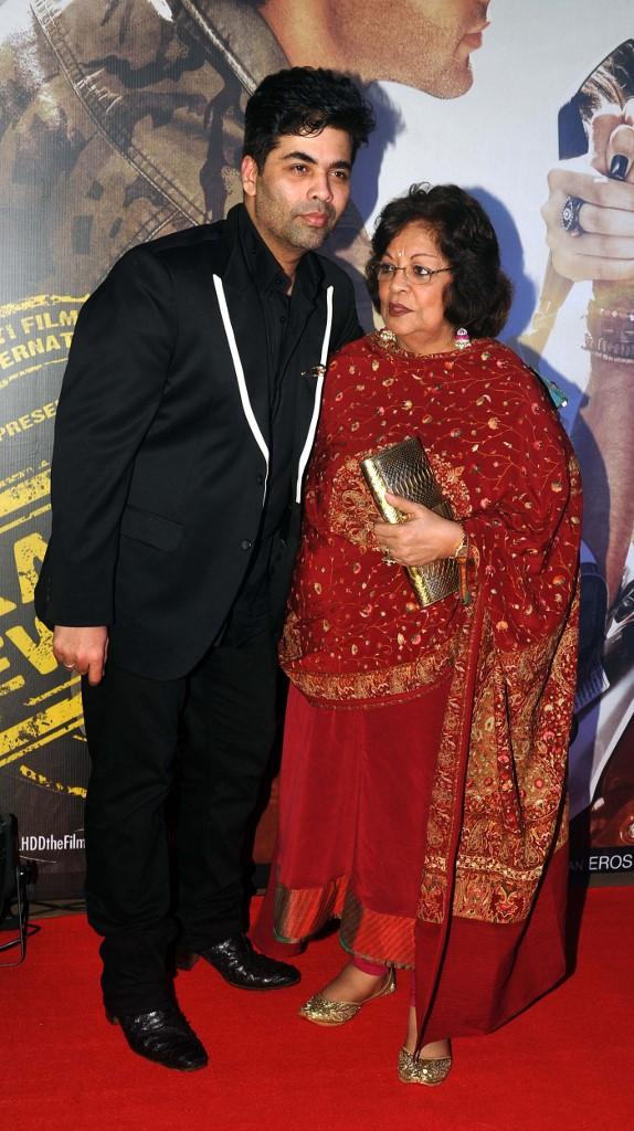 Karan Johar and his mother attend the premier of Hindi film 'Lekar Hum Deewana Dil' in Mumbai on July 3, 2014.