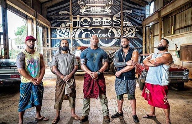 Roman Reigns made his acting debut in the 2019 blockbuster Hobbs & Shaw starring his cousin Dwayne Johnson and Jason Statham as well as The Wrong Missy. Reigns has appeared on reality television shows. 
In picture: Roman Reigns on sets of Hobbs & Shaw with Dwayne Johnson and the other cast members