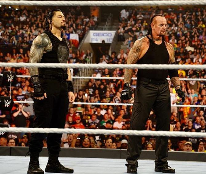 Roman Reigns beat the Undertaker in the main event at WrestleMania 33, becoming only the second WWE superstar besides Brock Lesnar to do so on the 'Grandest Stage of Them All'.
In picture: Roman Reigns with The Undertaker at Extreme Rules
