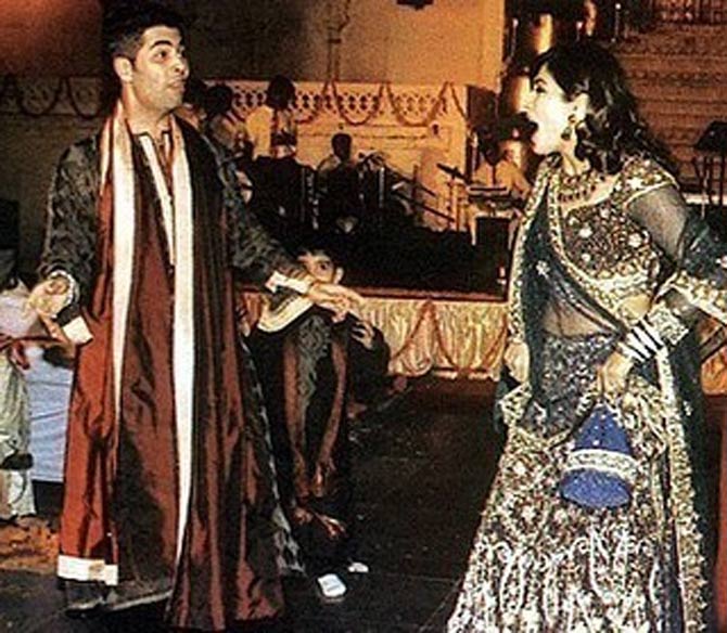In this one, Raveena Tandon and Karan Johar were seen having a whale of a time during one of her functions. She captioned the picture. 
